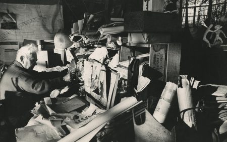 Calder at his desk in his Roxbury studio (1964)