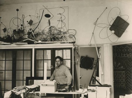 Calder in his studio at 14 rue de la Colonie (1931)