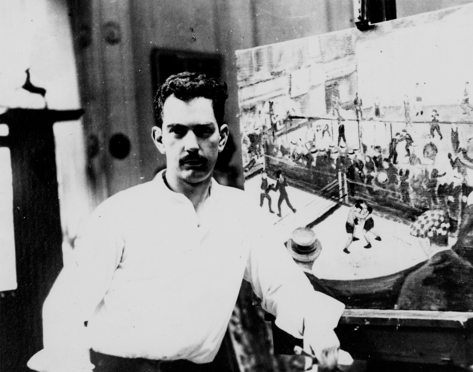 Calder photographed in front of his painting (1924)